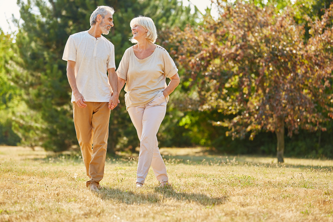 Happy Senior Citizens in Love Walking